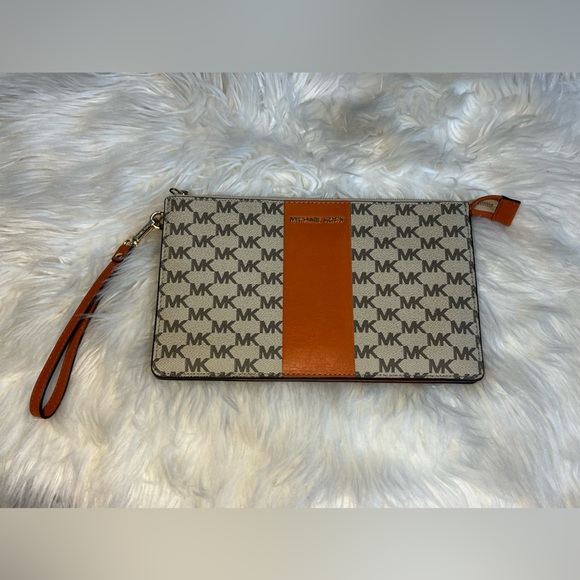 Michael Kors, orange and tan clutch with zipper. In great condition. LIKE NEW!! - Picture 4 of 13